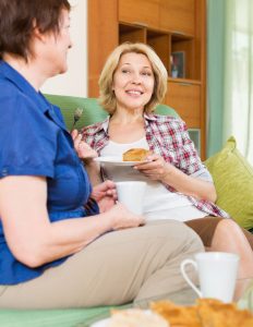 ladies chatting and drinking coffee