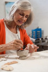 Lady doing pottery