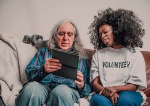 Tea, talk and tech helping use a tablet